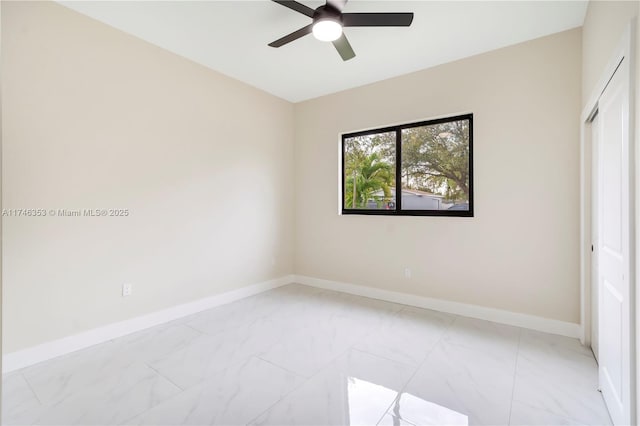 spare room featuring ceiling fan