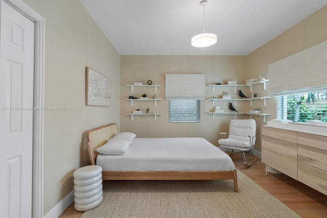 bedroom featuring wood-type flooring