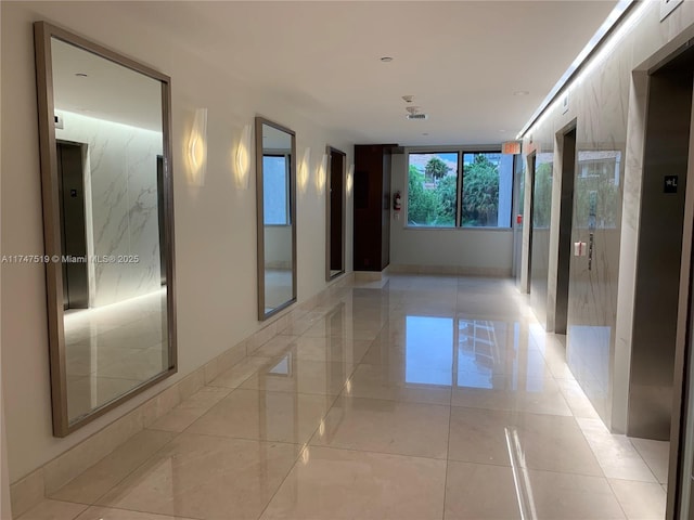 hallway featuring elevator