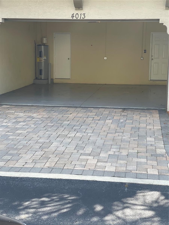 garage featuring water heater