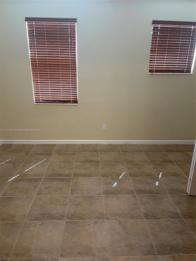 view of tiled spare room