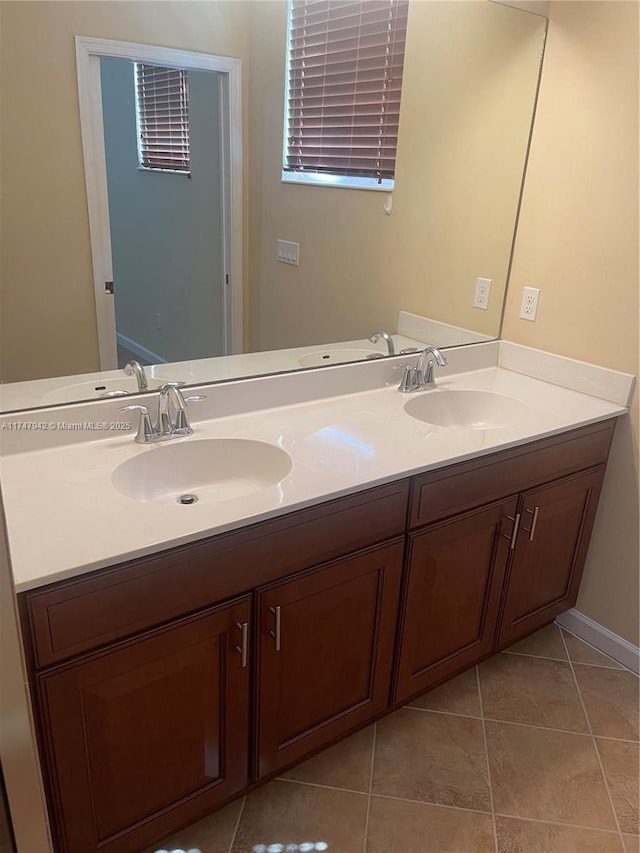 bathroom with vanity and tile patterned flooring