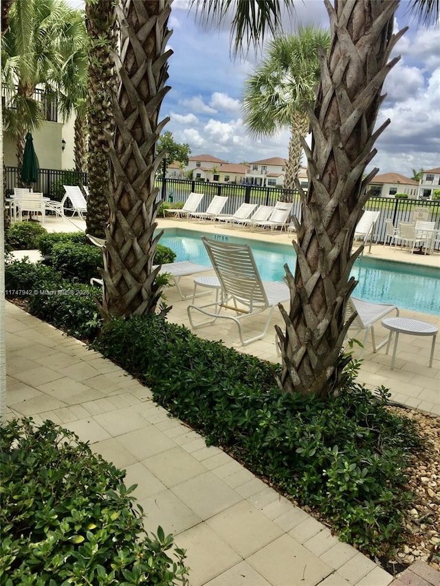 view of swimming pool featuring a patio