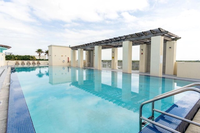 view of pool with a pergola