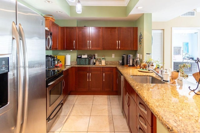 7270 SW 88th St Unit B308, Miami, FL 33156 - kitchen featuring stainless steel appliances, a sink, crown molding, light stone counters, and recessed lighting