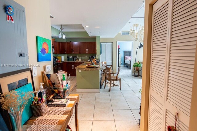 7270 SW 88th St Unit B308, Miami, FL 33156 - kitchen with light tile patterned floors, recessed lighting, and crown molding