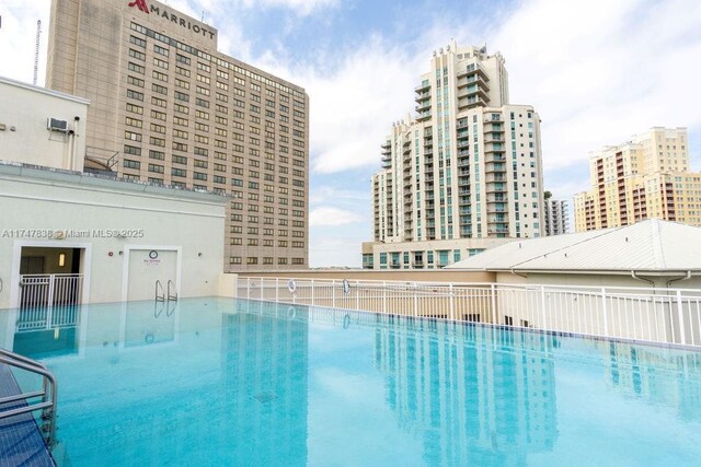 7270 SW 88th St Unit B308, Miami, FL 33156 - community pool featuring a view of city