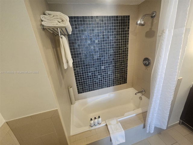 17315 Collins Ave Unit 1506, Sunny Isles Beach, FL 33160 - bathroom featuring tiled shower / bath combo and tile patterned floors