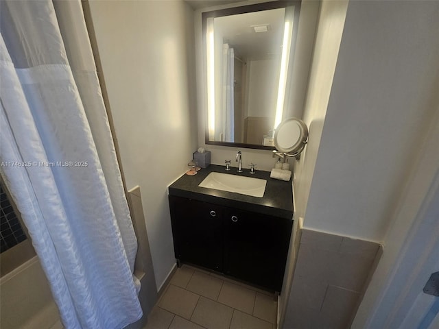 17315 Collins Ave Unit 1506, Sunny Isles Beach, FL 33160 - full bathroom featuring vanity, tile patterned floors, and curtained shower