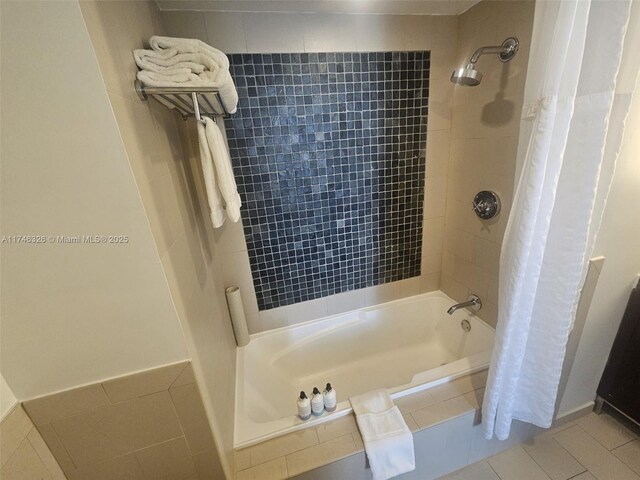17315 Collins Ave Unit 2306, Sunny Isles Beach, FL 33160 - bathroom with tiled shower / bath combo and tile patterned floors