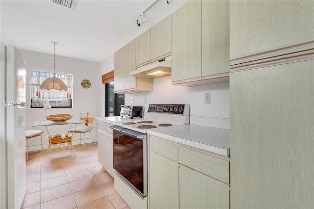 kitchen featuring light tile patterned flooring, under cabinet range hood, visible vents, light countertops, and white electric range oven