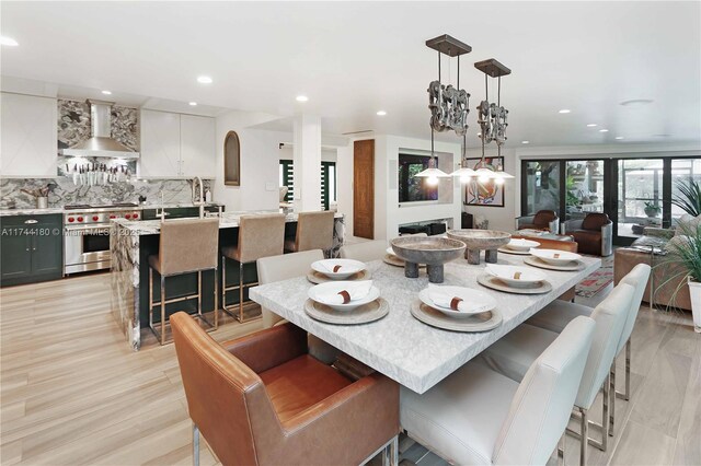 1301 Adams St, Hollywood, FL 33019 - dining area featuring light wood-type flooring