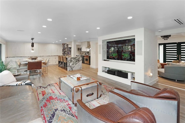 1301 Adams St, Hollywood, FL 33019 - living room featuring light hardwood / wood-style floors