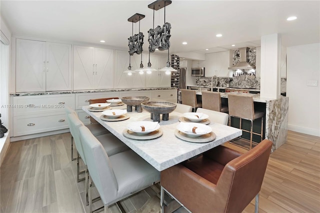 1301 Adams St, Hollywood, FL 33019 - dining room with light hardwood / wood-style flooring