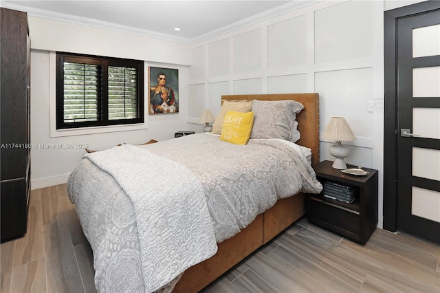 1301 Adams St, Hollywood, FL 33019 - bedroom with hardwood / wood-style flooring and ornamental molding