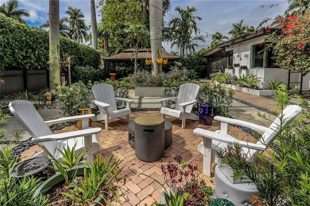 1301 Adams St, Hollywood, FL 33019 - view of patio / terrace featuring a gazebo and a fire pit