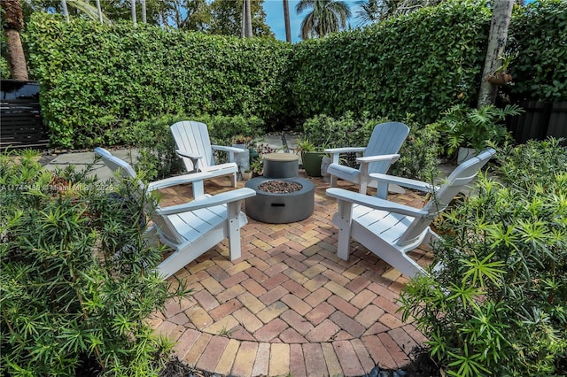 1301 Adams St, Hollywood, FL 33019 - view of patio / terrace featuring an outdoor fire pit