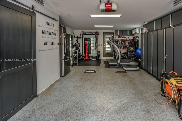 1301 Adams St, Hollywood, FL 33019 - interior space featuring stainless steel refrigerator, a wall mounted AC, and a garage door opener