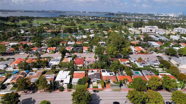 aerial view with a water view and a residential view