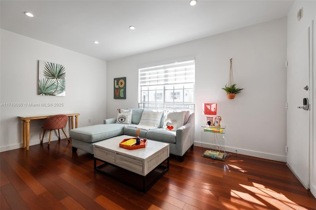 living room with dark wood-type flooring