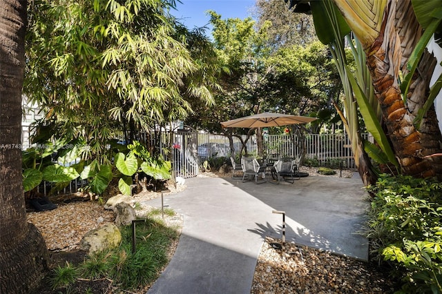 view of home's community featuring a patio area