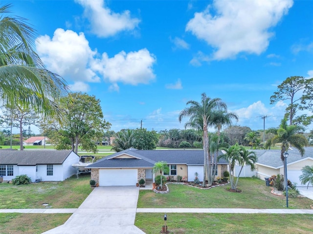 single story home featuring a front yard and a garage