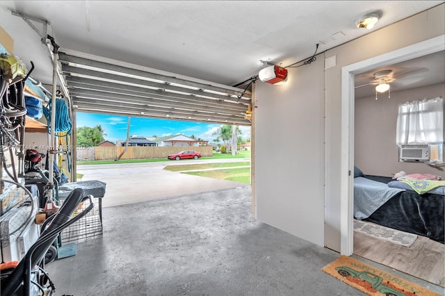 garage with cooling unit and a garage door opener