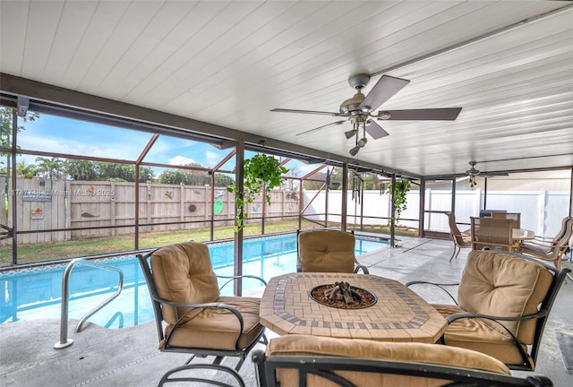 sunroom with a swimming pool