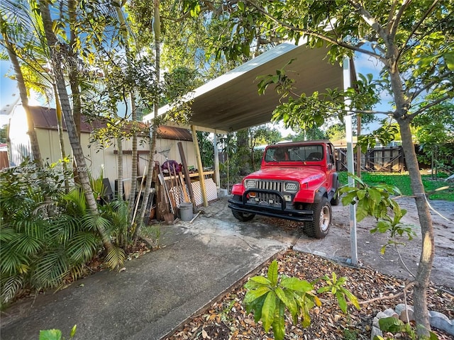 view of vehicle parking featuring a carport