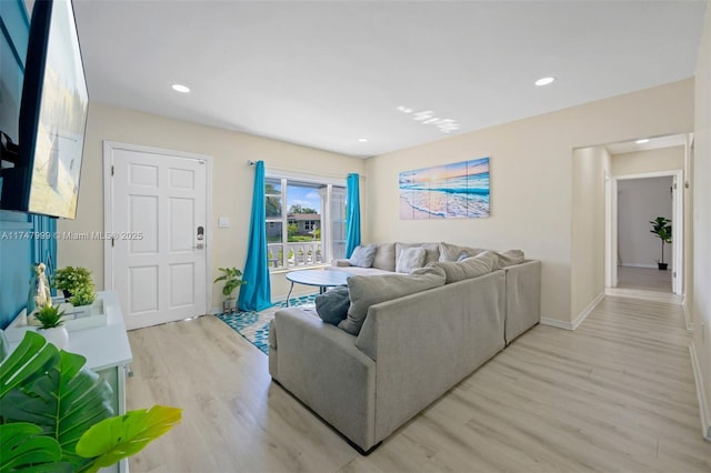 living room featuring light wood-type flooring