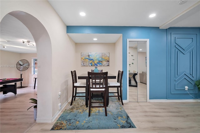 dining area with light hardwood / wood-style floors