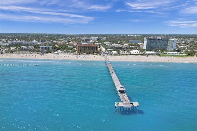 bird's eye view with a view of the beach, a water view, and a view of city