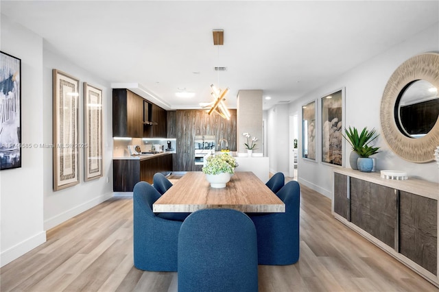 dining area featuring light hardwood / wood-style floors