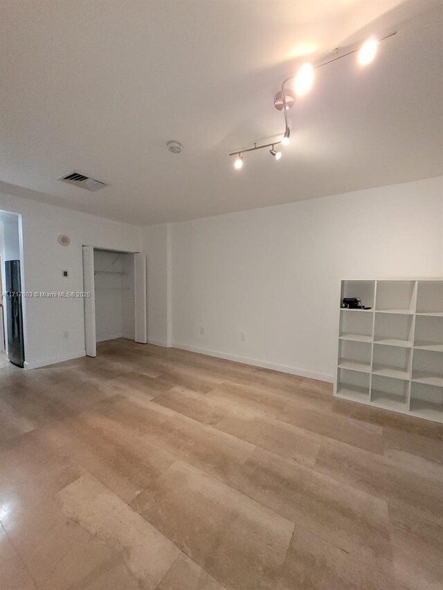 10275 Collins Ave Unit 111, Bal Harbour, FL 33154 - unfurnished room featuring track lighting
