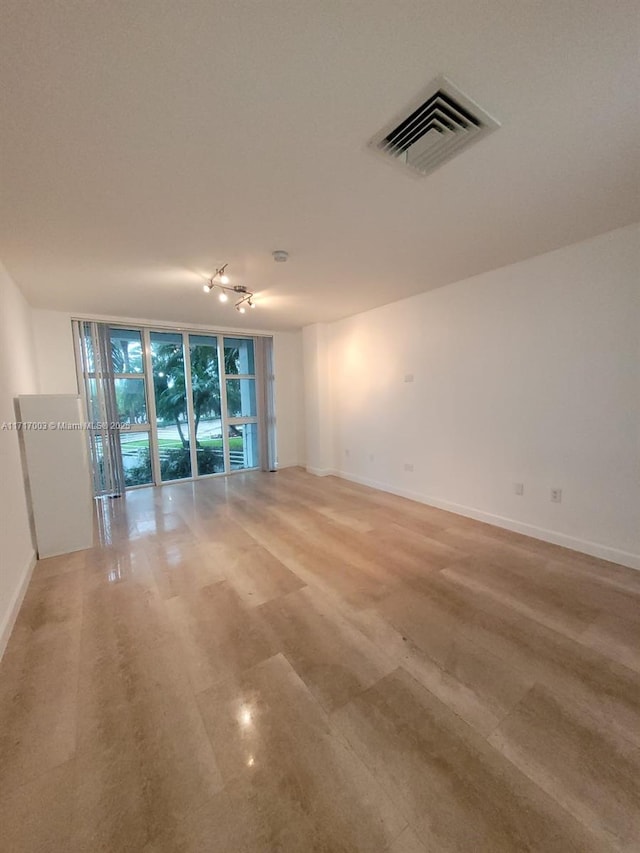 10275 Collins Ave Unit 111, Bal Harbour, FL 33154 - empty room featuring expansive windows