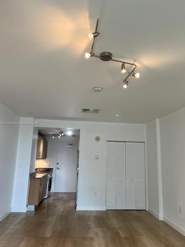 10275 Collins Ave Unit 111, Bal Harbour, FL 33154 - interior space with rail lighting