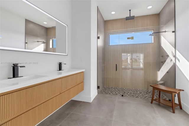 full bathroom with tile patterned flooring, recessed lighting, a sink, a shower stall, and double vanity