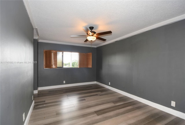 unfurnished room with ceiling fan, dark wood-type flooring, crown molding, and a textured ceiling