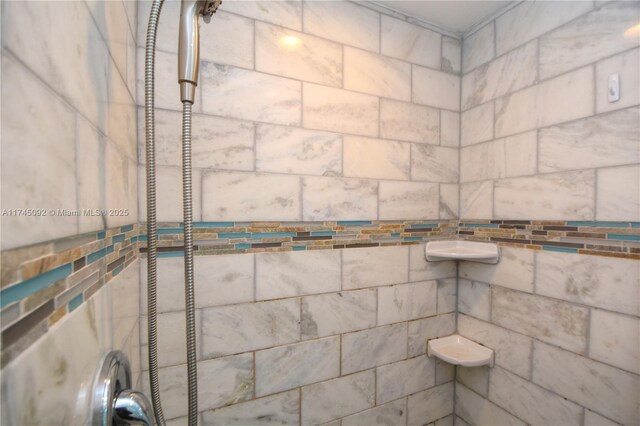 8639 Eagle Run Dr Unit 11, Boca Raton, FL 33434 - full bathroom featuring a tile shower