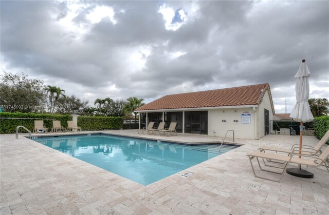 8639 Eagle Run Dr Unit 11, Boca Raton, FL 33434 - community pool with a patio area