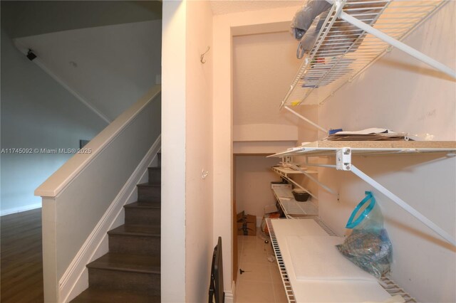 8639 Eagle Run Dr Unit 11, Boca Raton, FL 33434 - staircase with tile patterned flooring