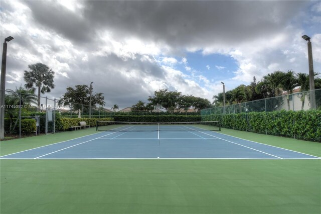 8639 Eagle Run Dr Unit 11, Boca Raton, FL 33434 - view of tennis court with community basketball court