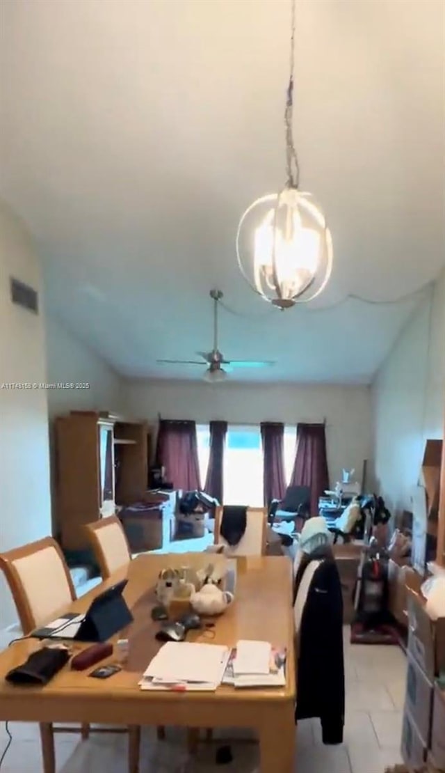 dining room with vaulted ceiling and ceiling fan