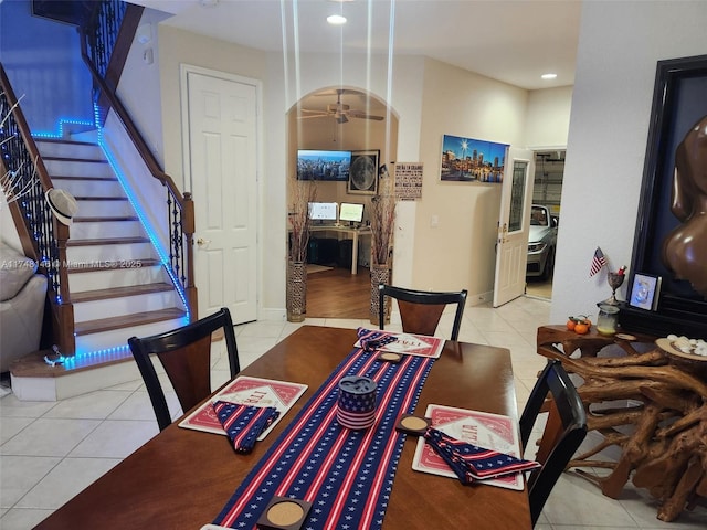 dining room with light tile patterned flooring and ceiling fan