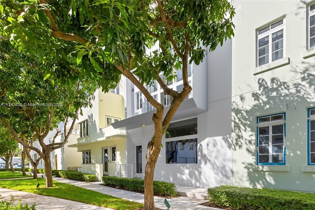 211 Water Way Unit 211, Miami Beach, FL 33141 - exterior space featuring stucco siding and a residential view