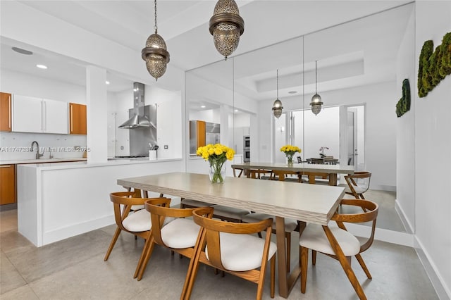 211 Water Way Unit 211, Miami Beach, FL 33141 - dining space featuring a raised ceiling, baseboards, and recessed lighting