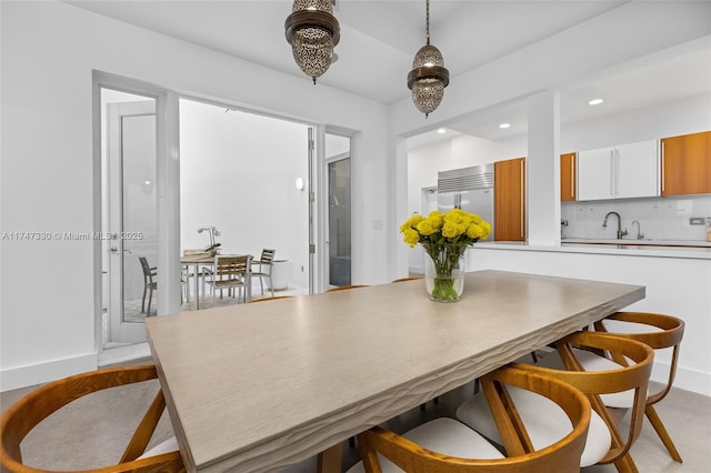 211 Water Way Unit 211, Miami Beach, FL 33141 - dining room featuring baseboards and recessed lighting