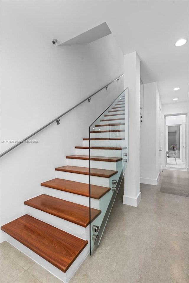 211 Water Way Unit 211, Miami Beach, FL 33141 - stairway with concrete flooring, baseboards, and recessed lighting
