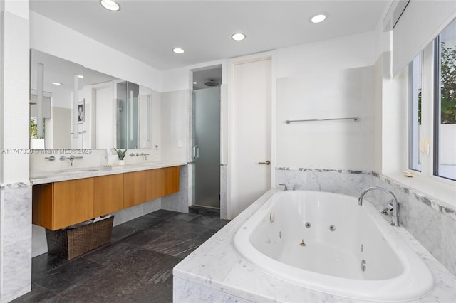 211 Water Way Unit 211, Miami Beach, FL 33141 - full bath featuring double vanity, recessed lighting, a sink, a stall shower, and a whirlpool tub