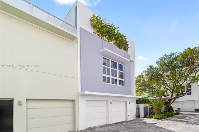 211 Water Way Unit 211, Miami Beach, FL 33141 - view of side of property with stucco siding